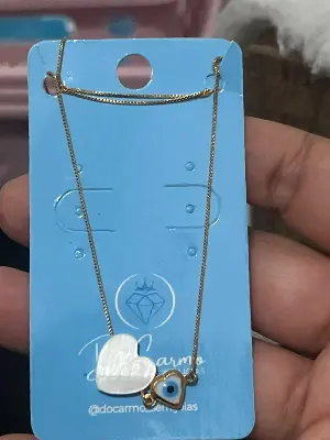 colar com pingente de coração e olho grego