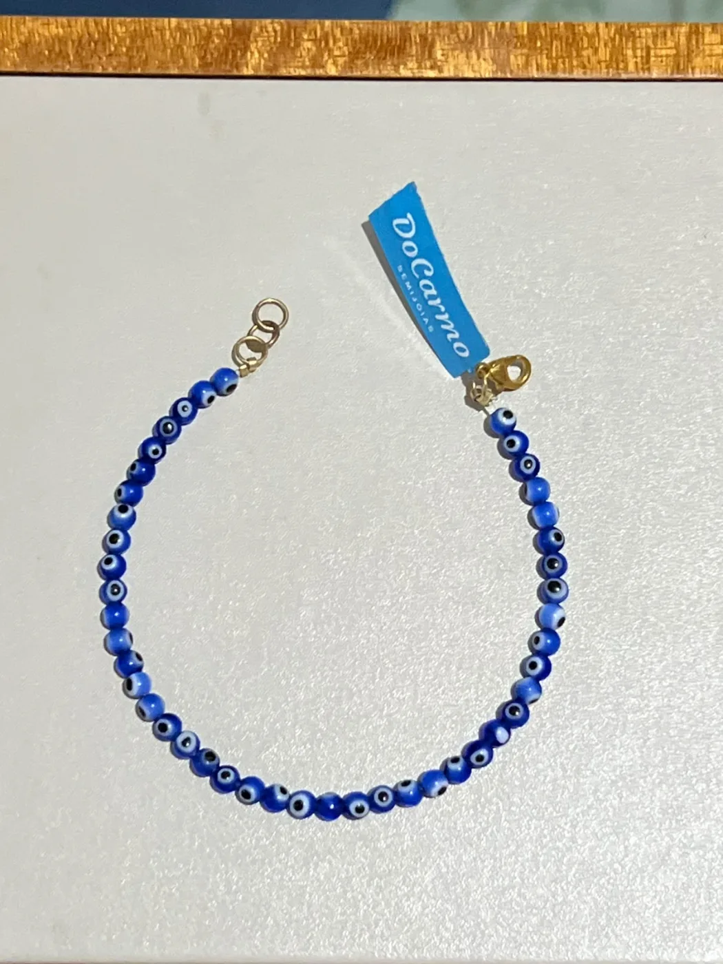 pulseira de miçangas azul com olho grego