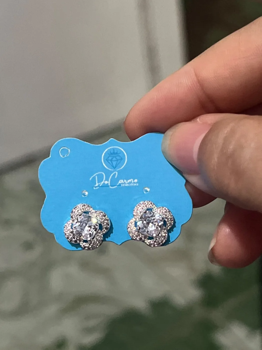 brincos flor com pedra zirc. crav