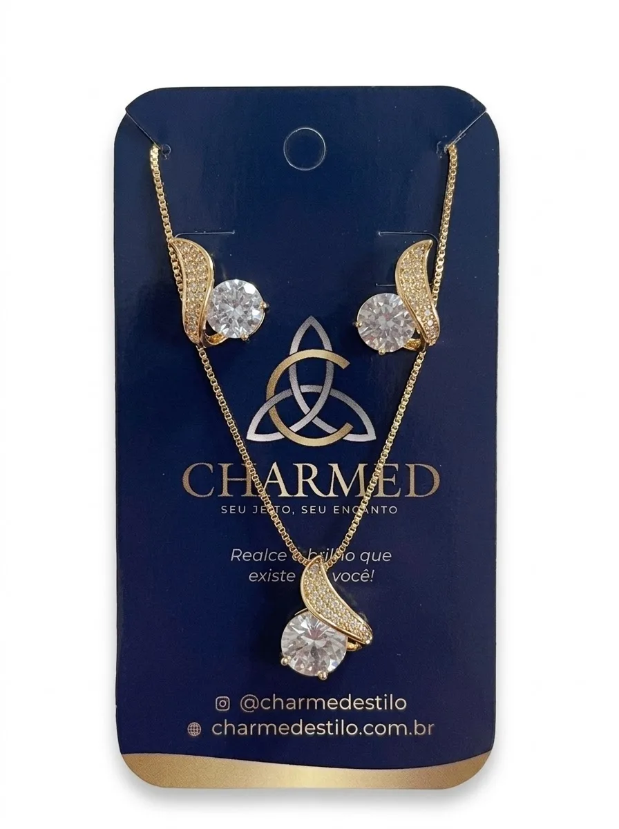 Conjunto de colar e brincos com zircônias cristal e detalhes dourados