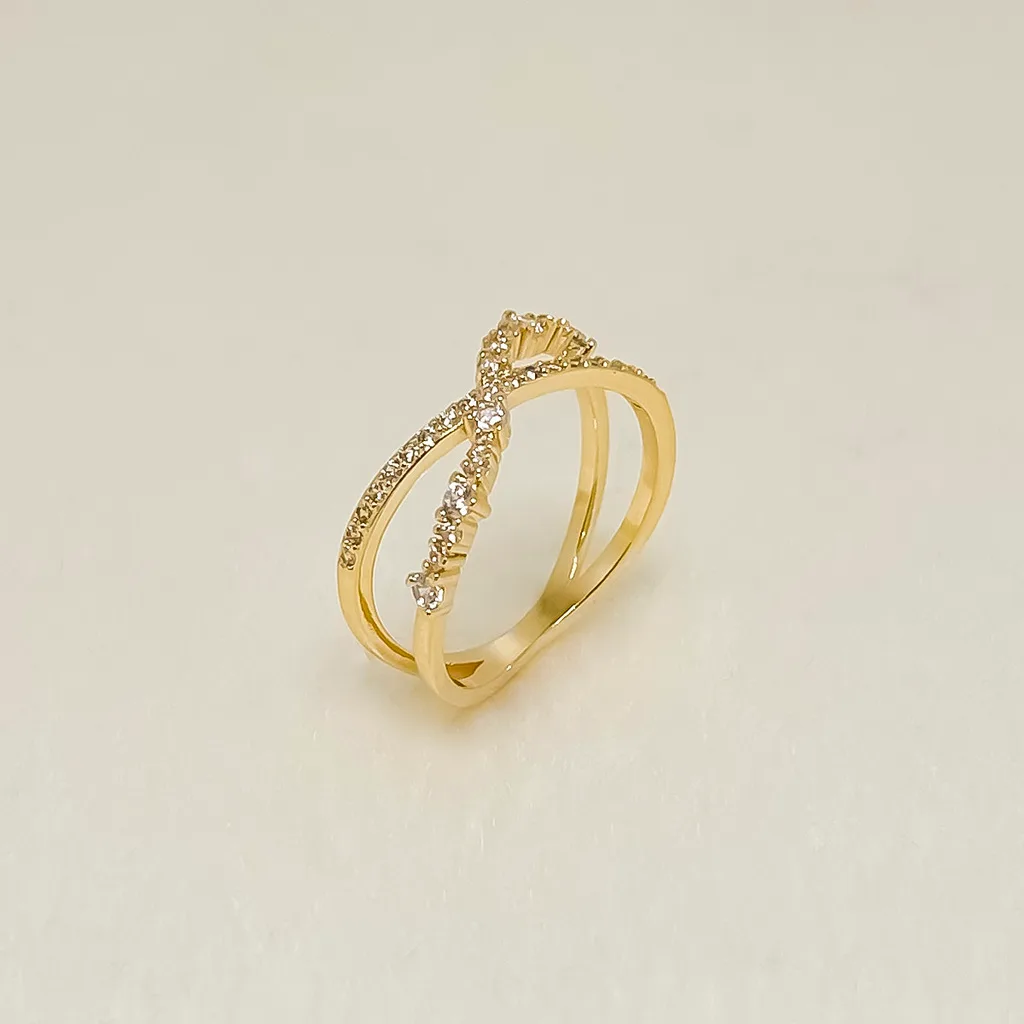 ANEL TRANSPASSADO CRAVEJADO - BANHO OURO 18K