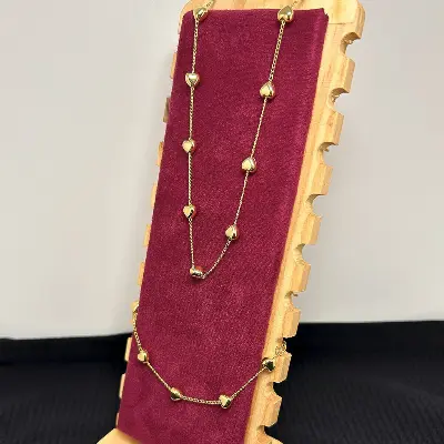 CONJUNTO PULSEIRA E COLAR CORAÇÕES BANHADO A OURO 18K