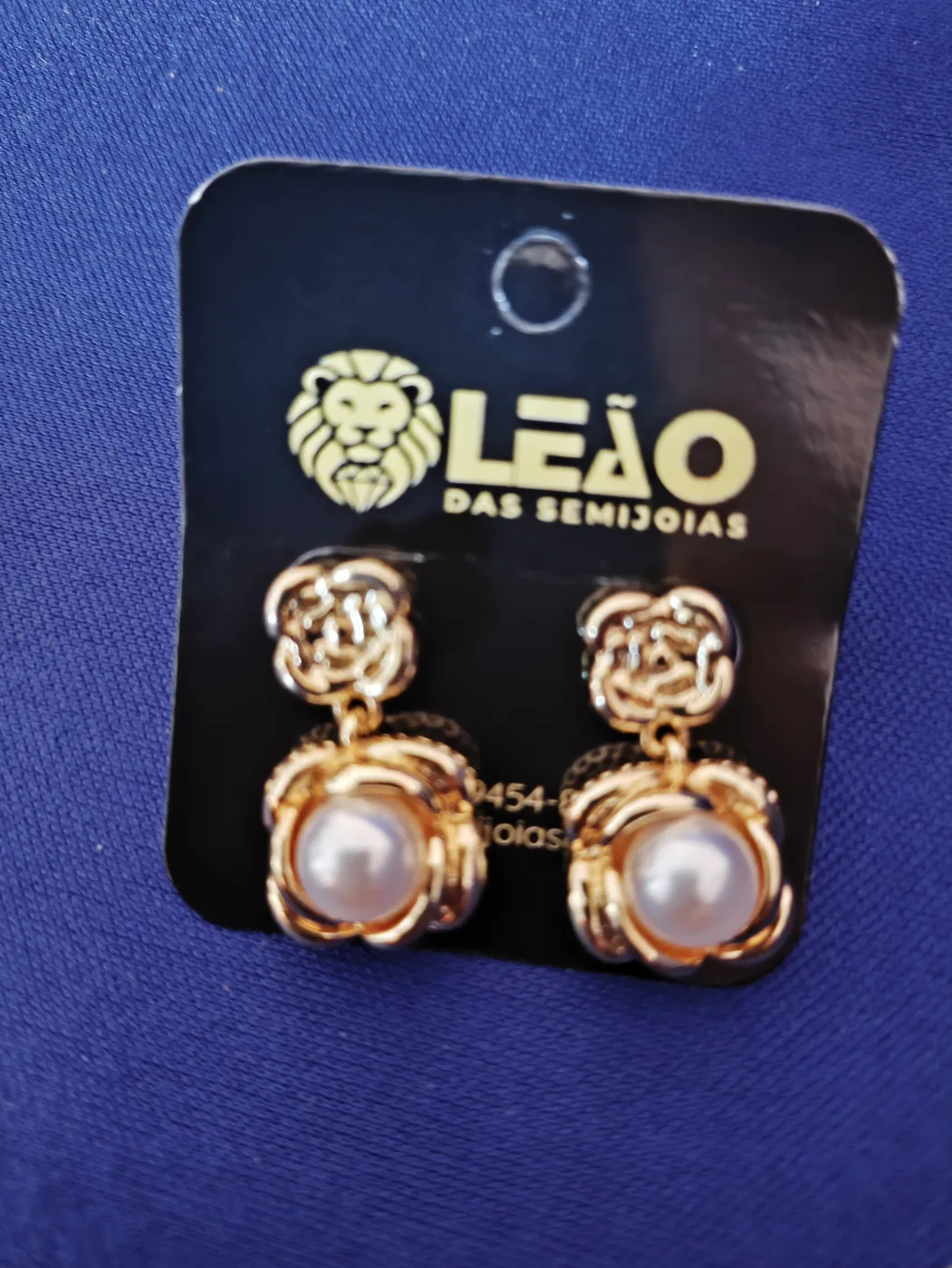 78900387 Brinco Flor com pérola
